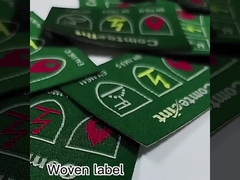 금과 은 금과 은 류렉스 직물 의류 중간에 접힌 브랜드 라벨